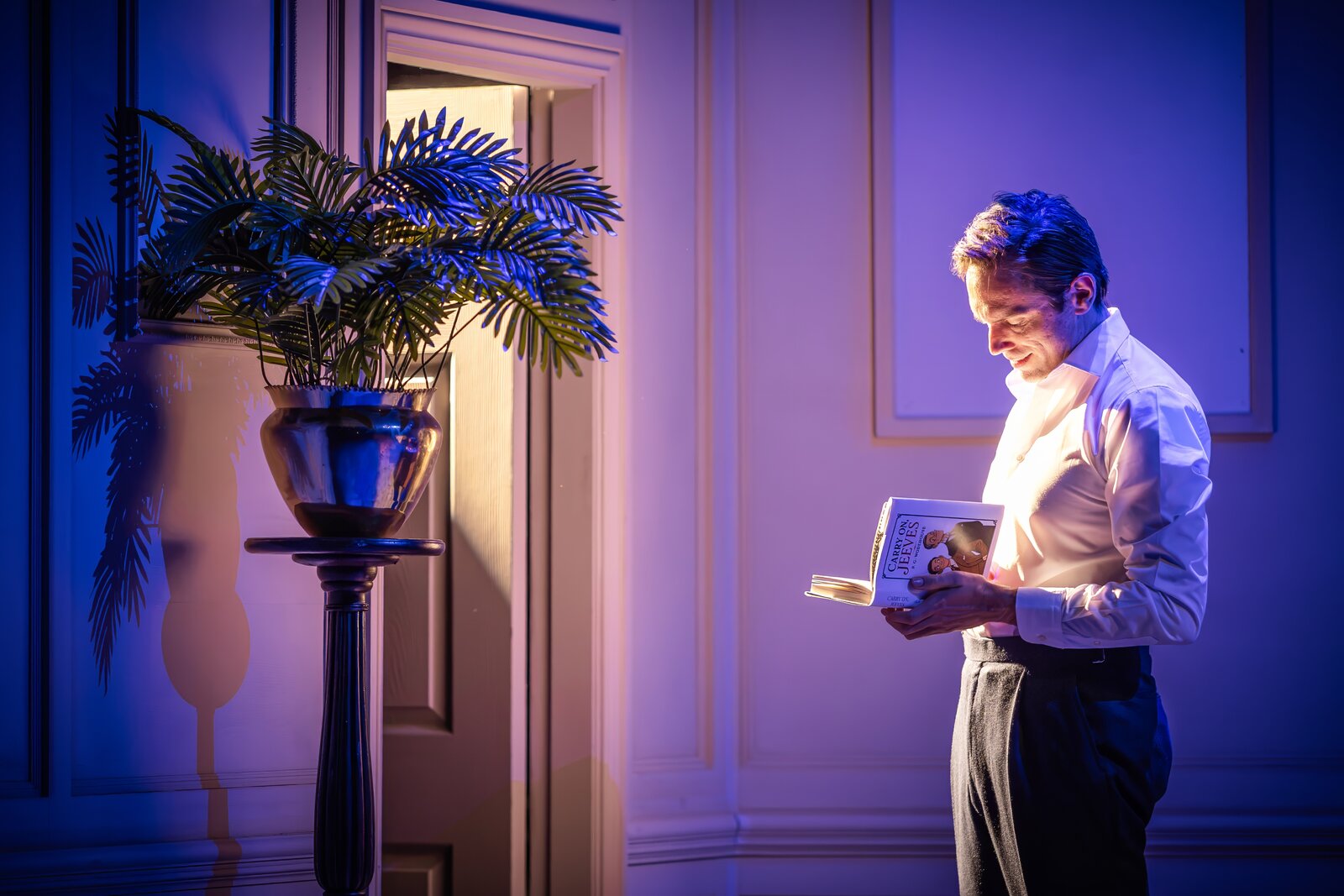 Sam Harrison as Bertie reading Carry On, Jeeves