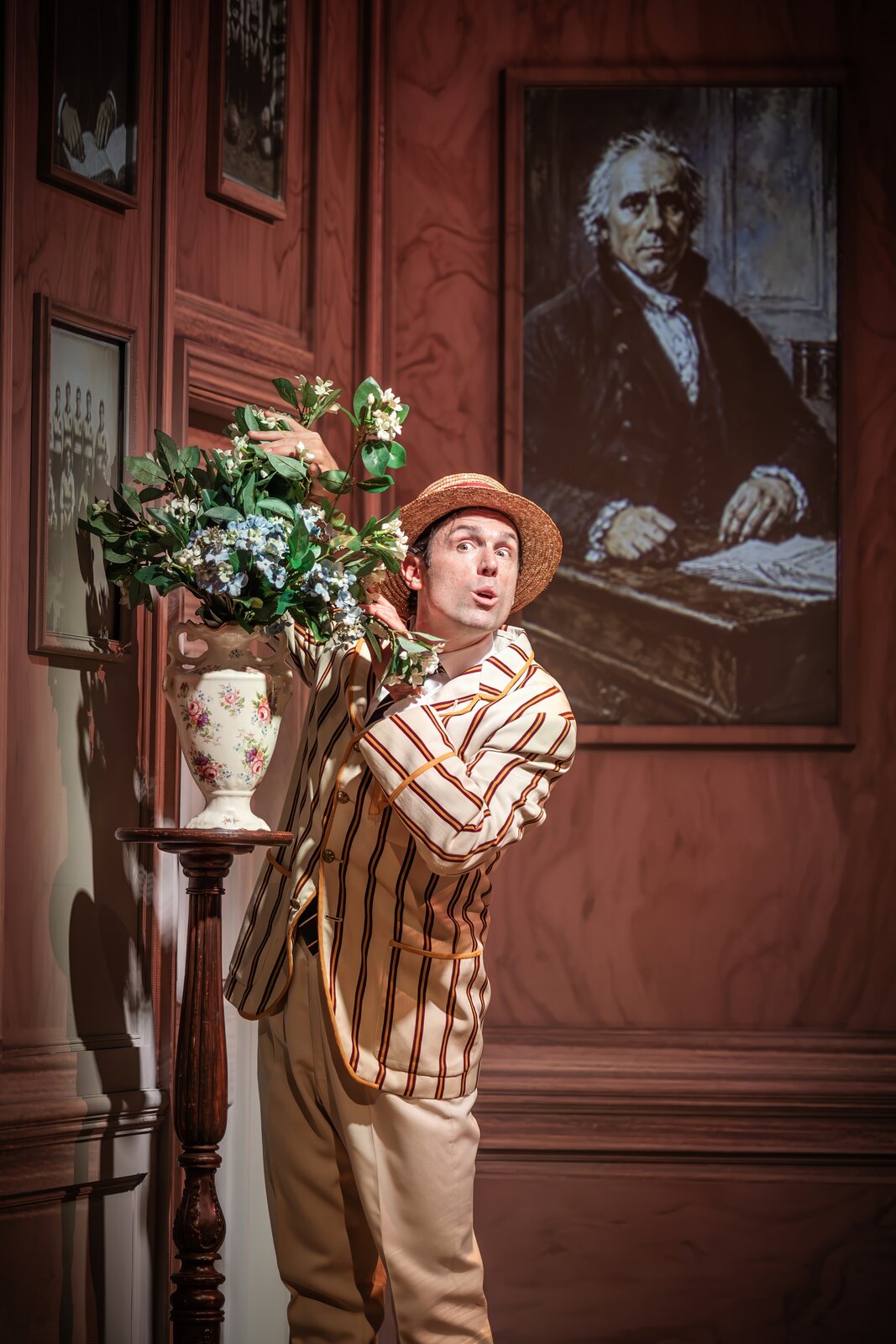 Sam Harrison holding flowers in a comic scene, Jeeves Takes Charge