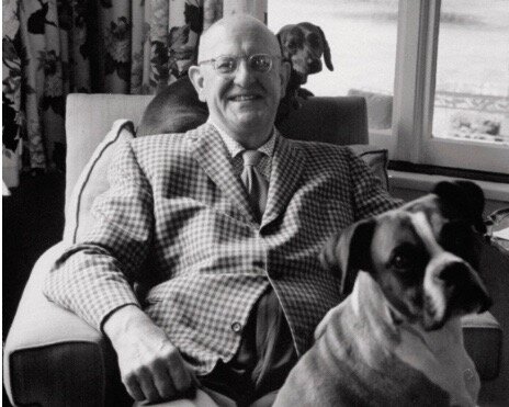 P.G. Wodehouse at home with his dog